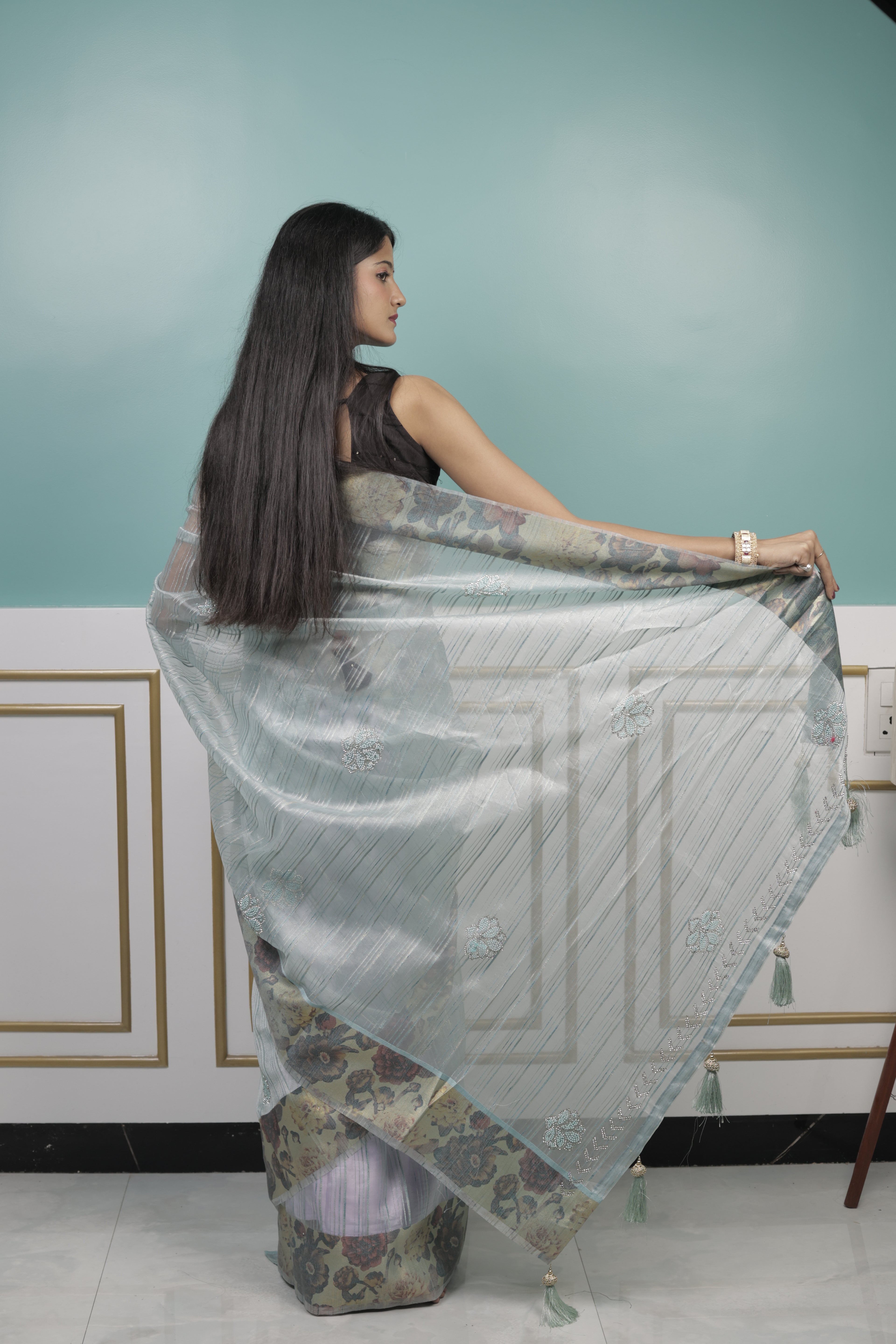 Pastel Blue Organza Saree with Floral Design & Subtle Embellishments