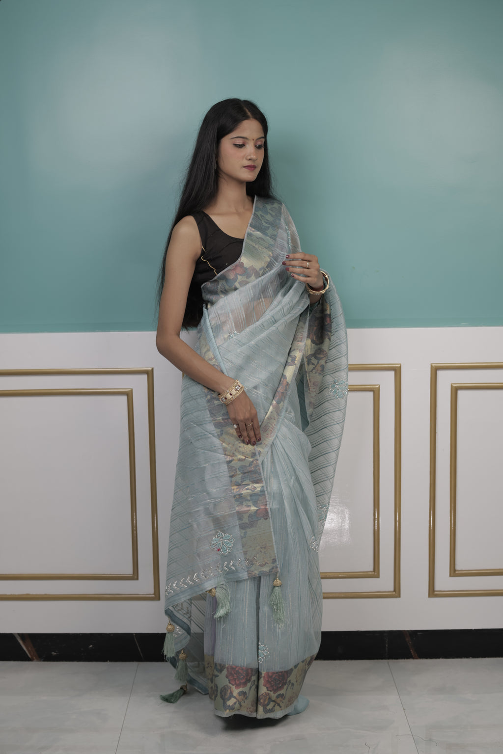 Pastel Blue Organza Saree with Floral Design & Subtle Embellishments