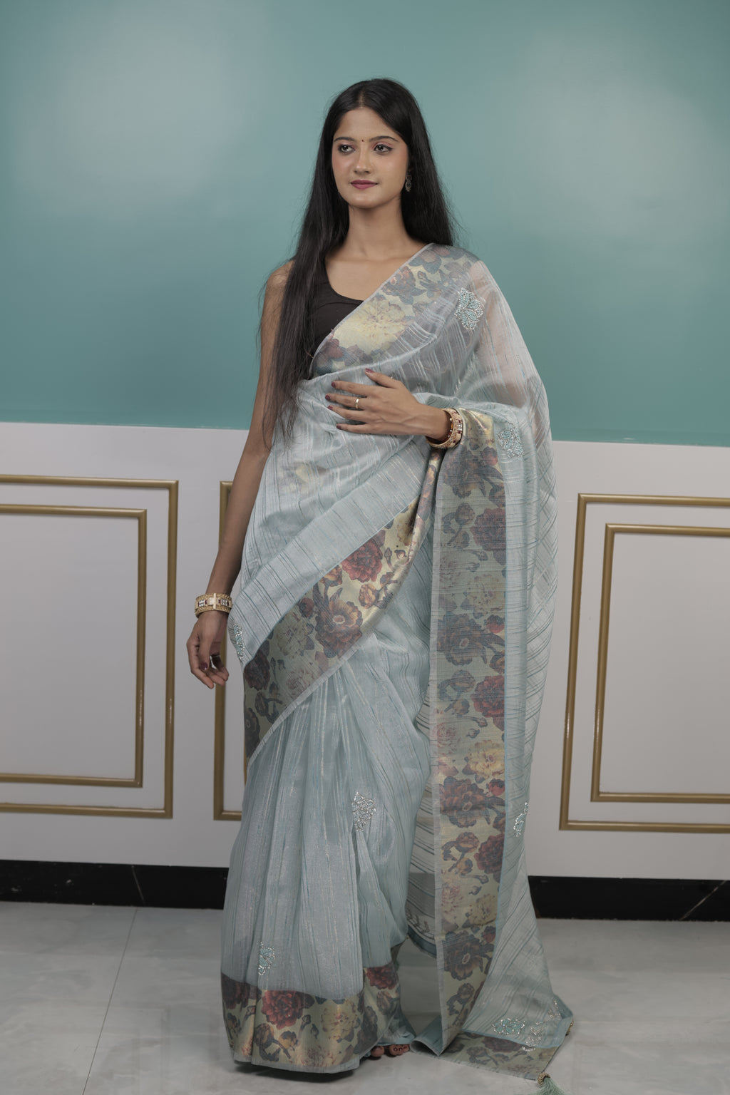 Pastel Blue Organza Saree with Floral Design & Subtle Embellishments