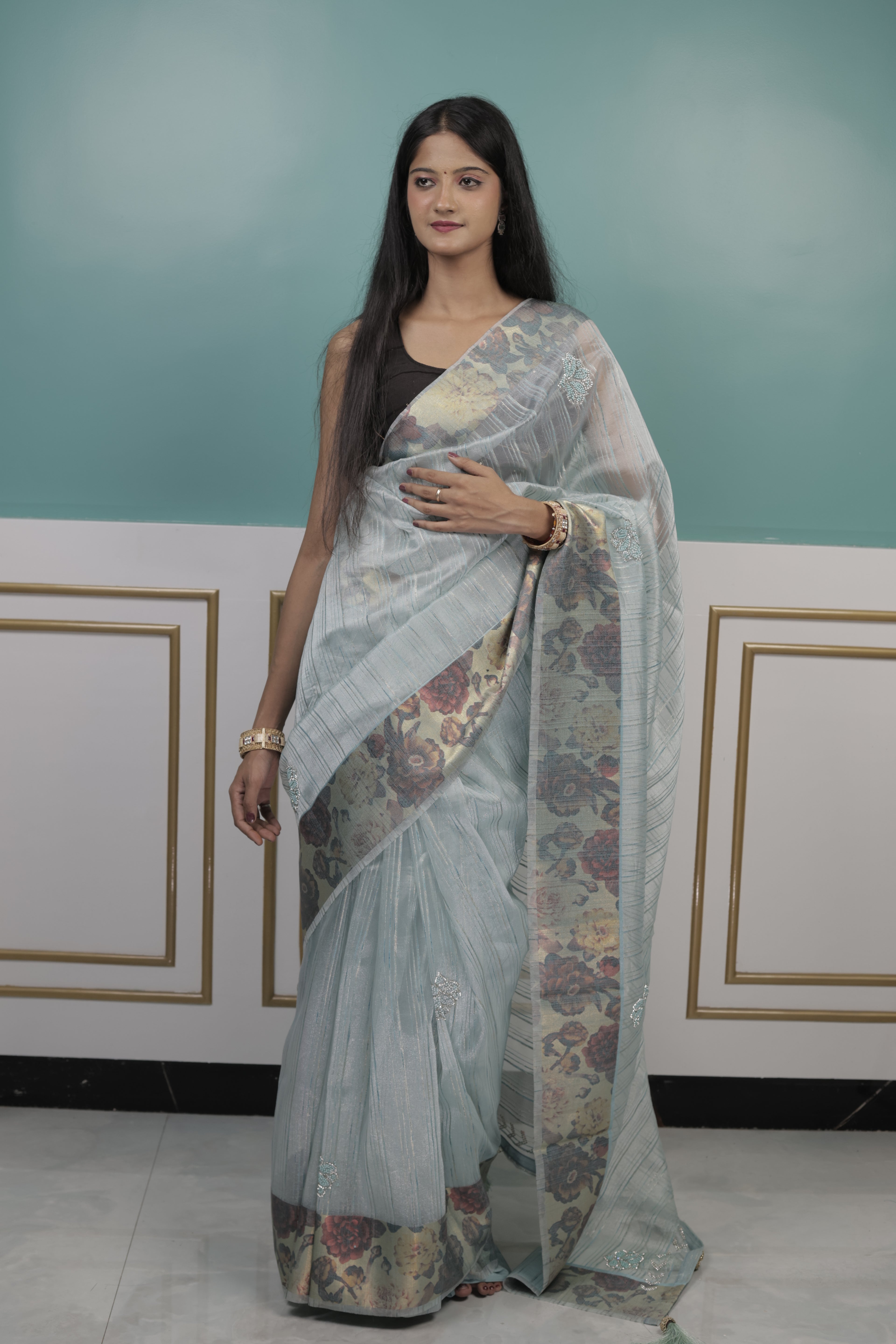 Pastel Blue Organza Saree with Floral Design & Subtle Embellishments