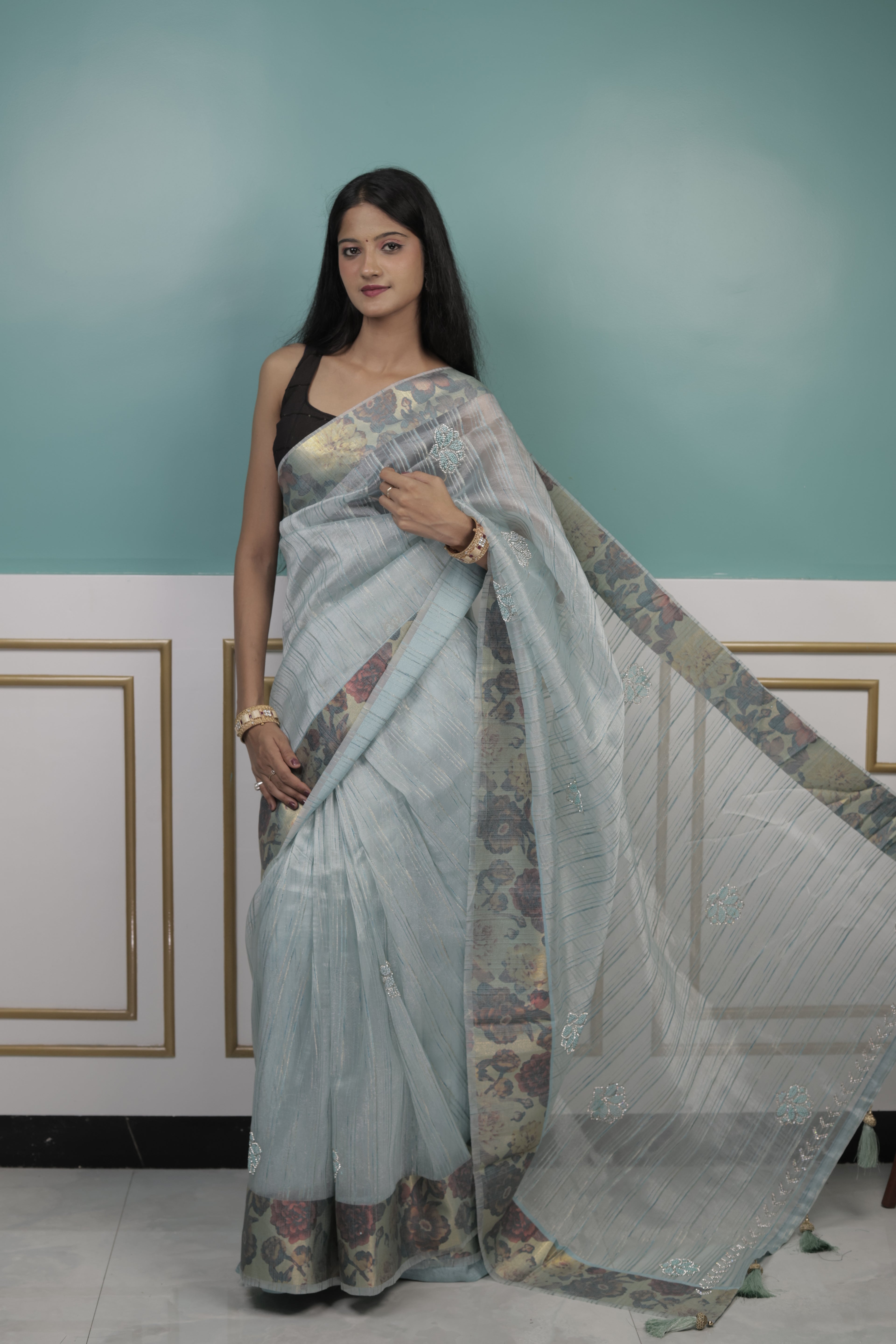 Pastel Blue Organza Saree with Floral Design & Subtle Embellishments