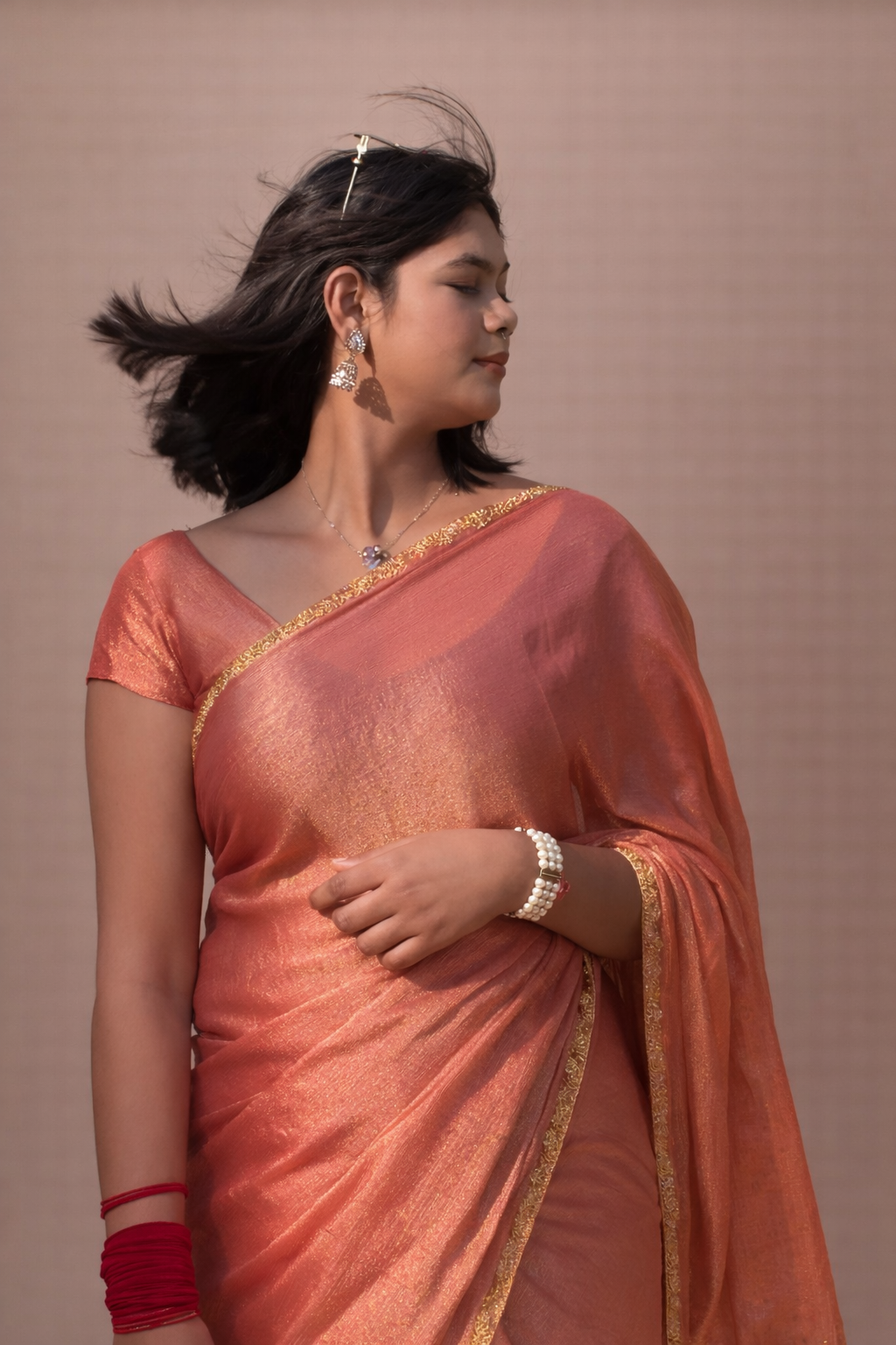 lets party {saree}      Peach Shade Chiffon Saree with golden pearl Border